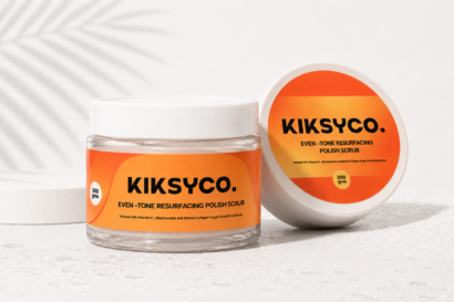 Kiksyco Tone Prep Resurfacing Polish Scrub in premium packaging, a gentle exfoliating body polish designed to prep and even out melanated skin tones.